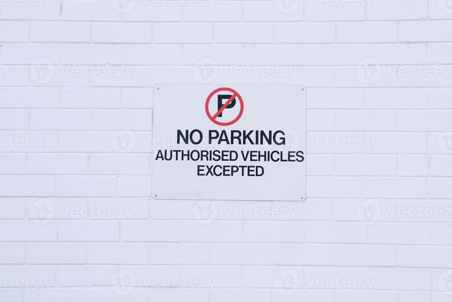 No parking sign, authorised vehicles excepted photo