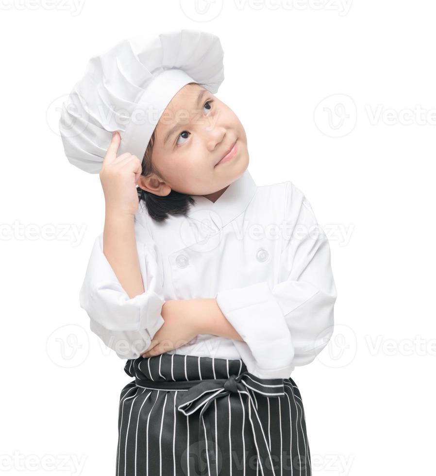 Cute little chef is thinking new menu. photo
