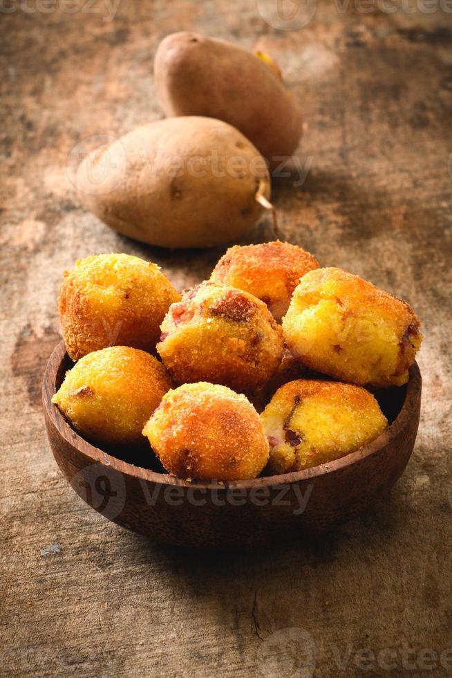 Potatoes balls on a bowl photo