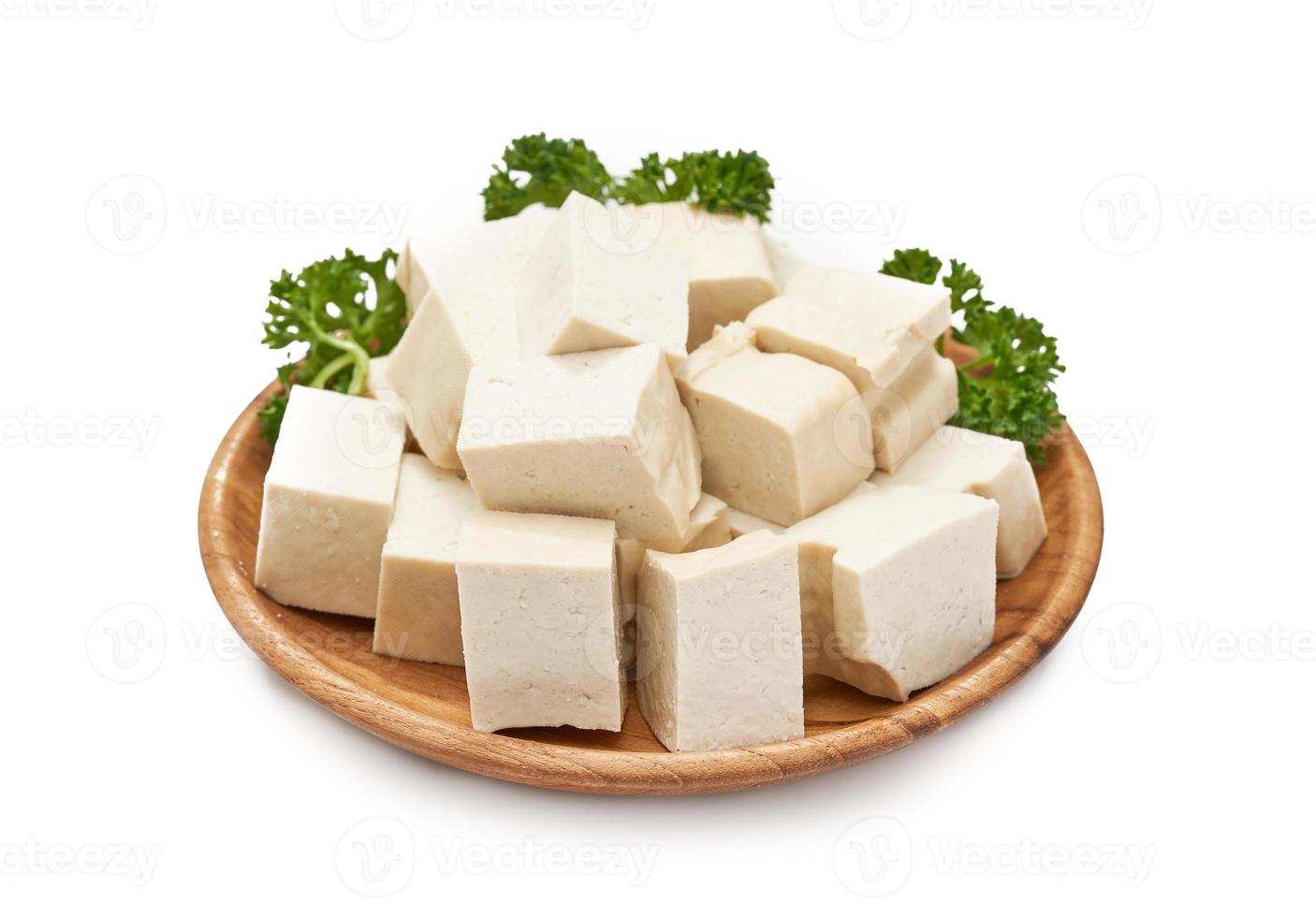 pile of white cube Tofu in wood plate isolated on white background. fresh white cube tofu isolated on background. heap of white cube tofu isolated on background photo