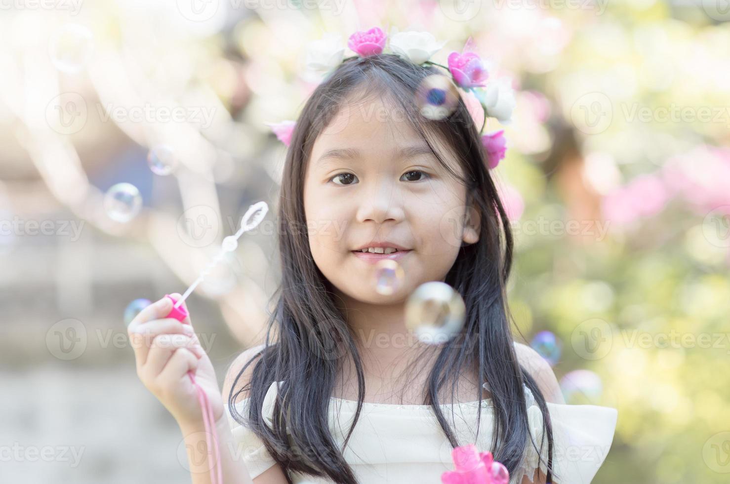 cute girl play bubble soup photo