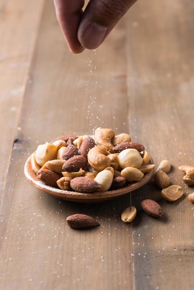 Mix cocktail nuts with salted on top 22845796 Stock Photo at Vecteezy