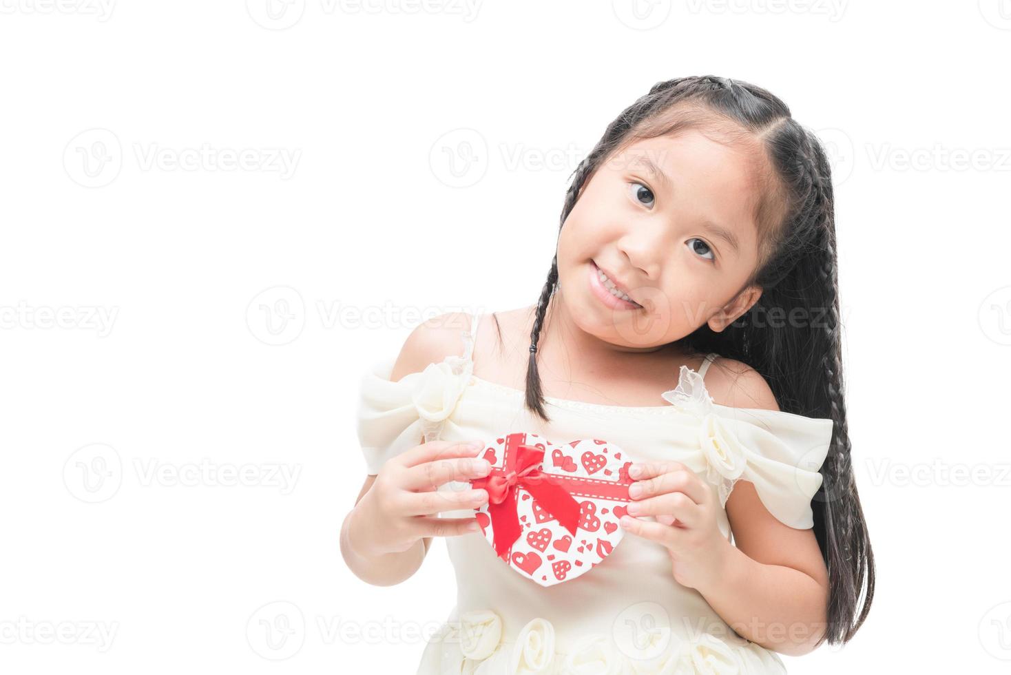 cute little bride hold heart gift on hand photo