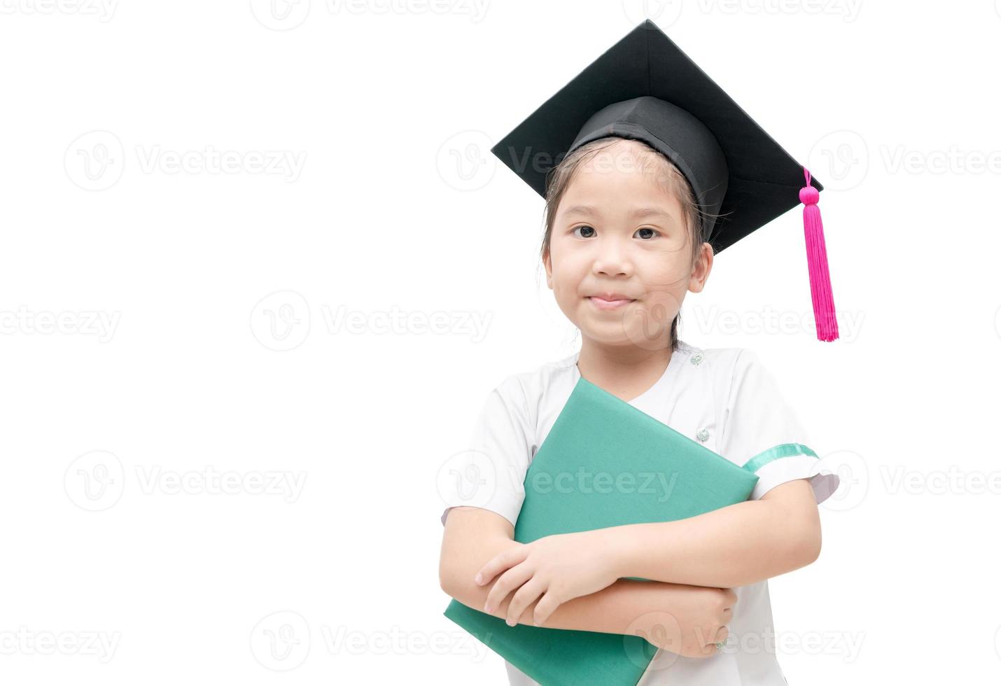 Asian school kid graduate with graduation cap photo