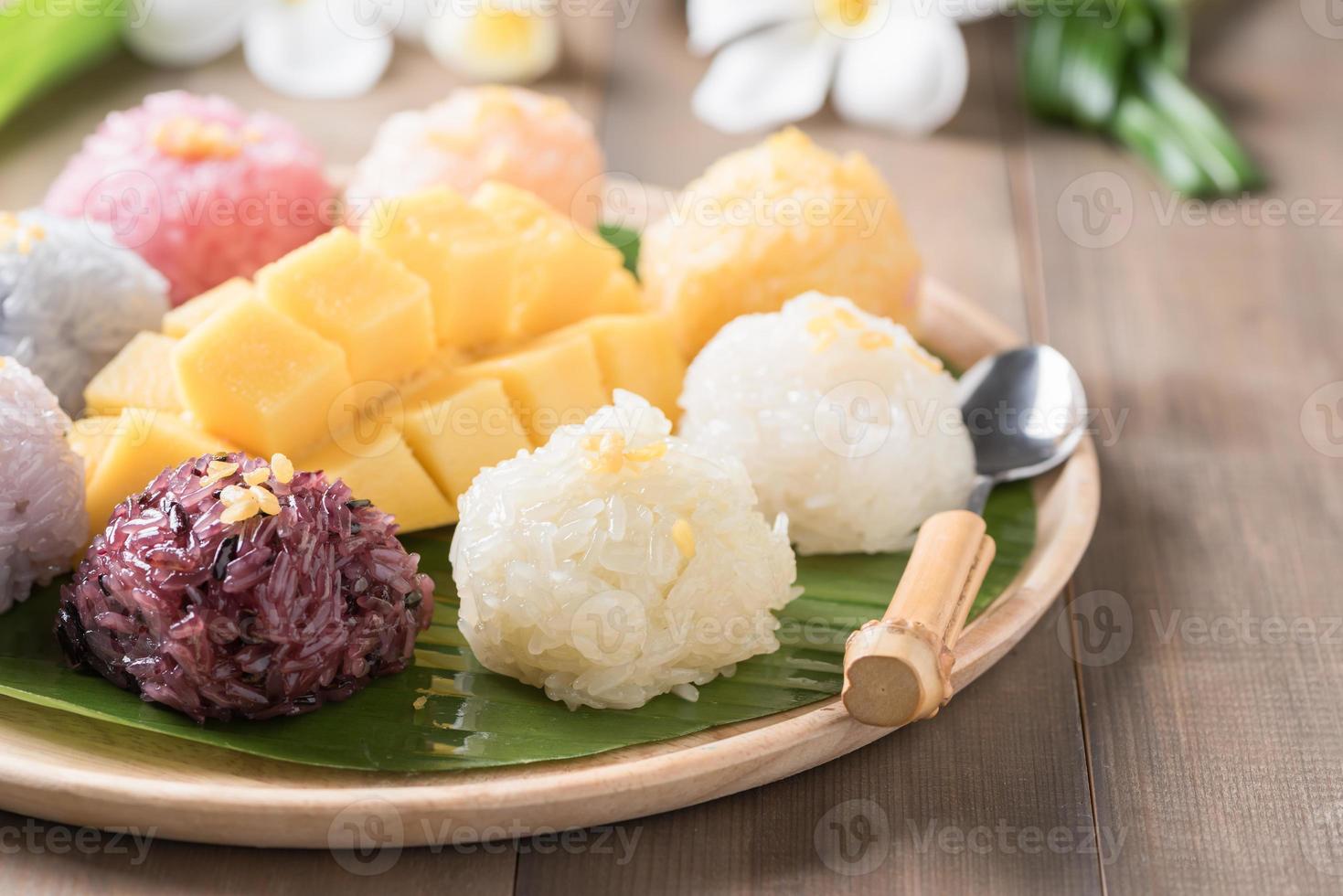 sticky rice with ripe mango on wood photo