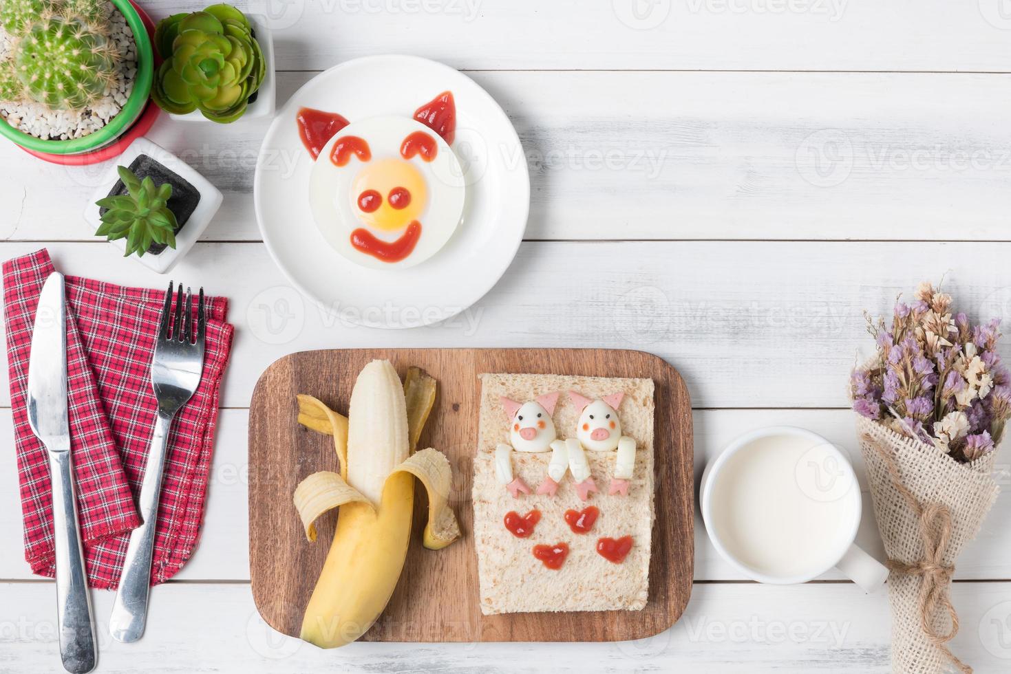 bread and banana of kid breakfast photo