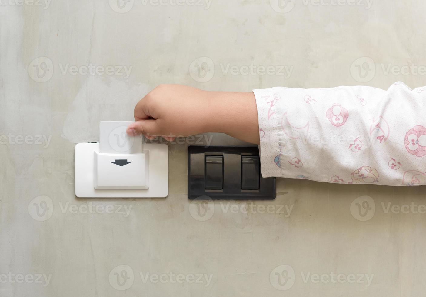 putting key card switch in hotel room photo