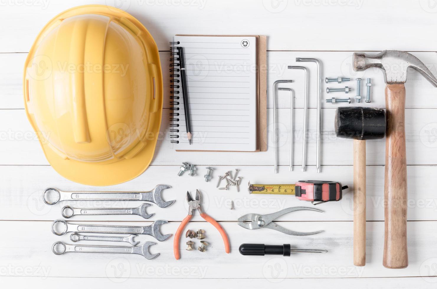 set of tools supplies on wood background photo