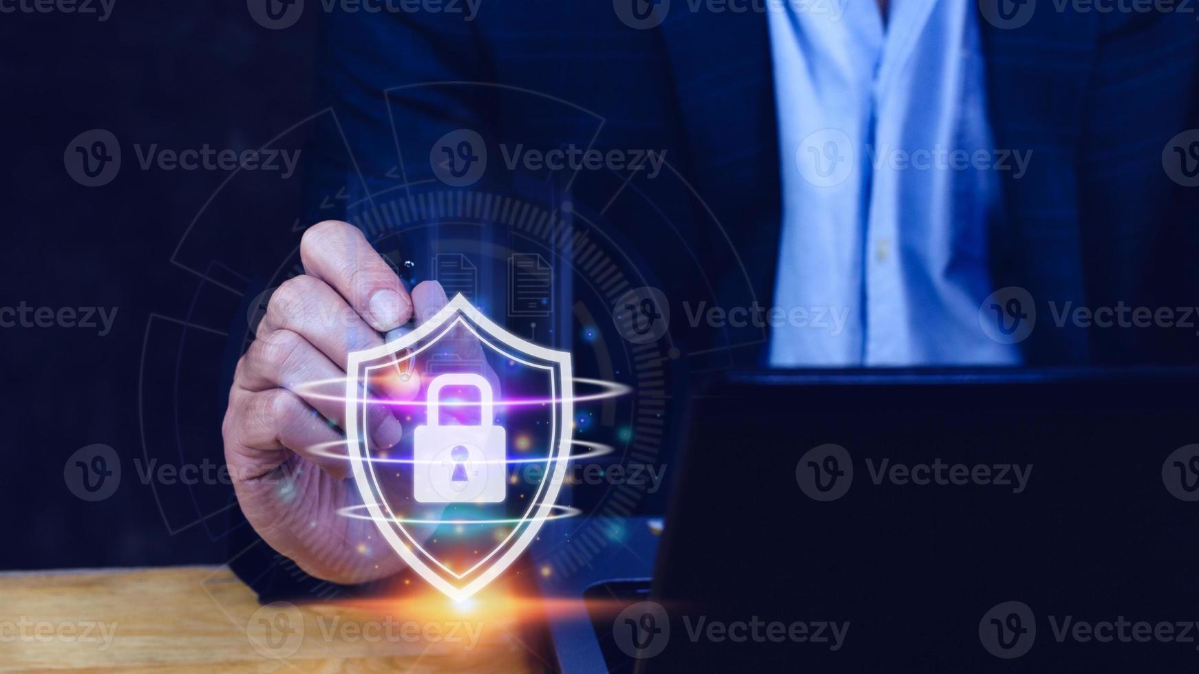 Computer network protection, secure and safe your data concept, businessman holding shield protection icon, Security shield Lock Security Businessman Protect Concept photo