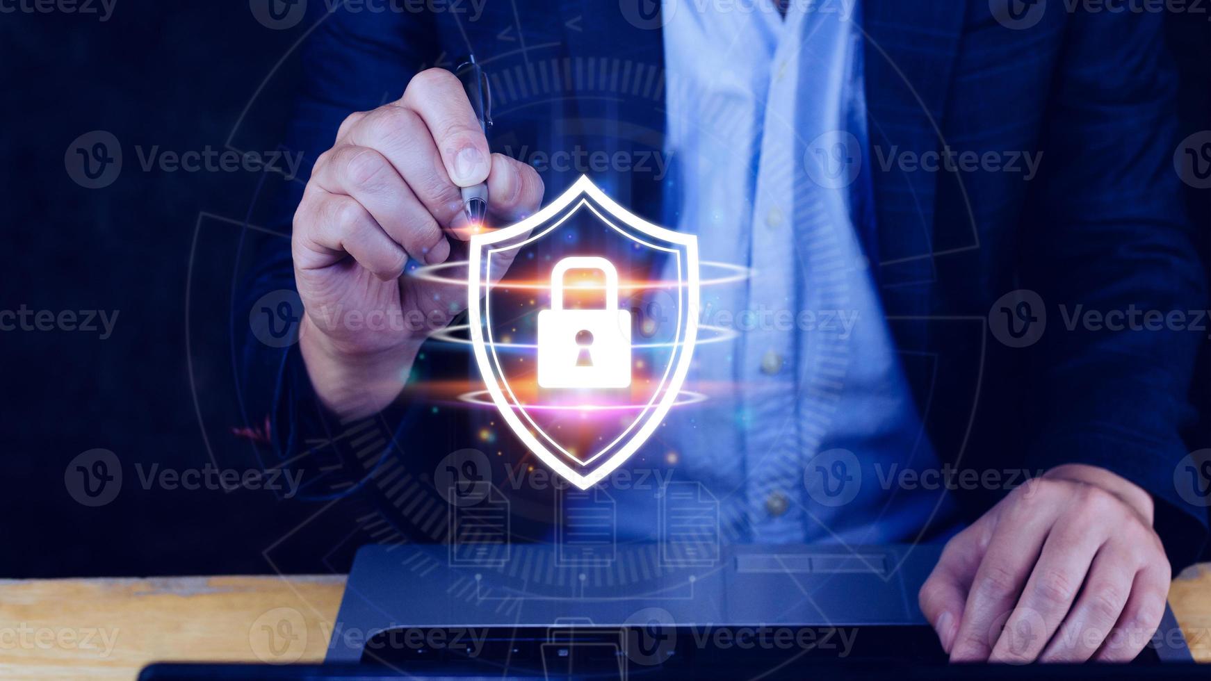 Computer network protection, secure and safe your data concept, businessman holding shield protection icon, Security shield Lock Security Businessman Protect Concept photo