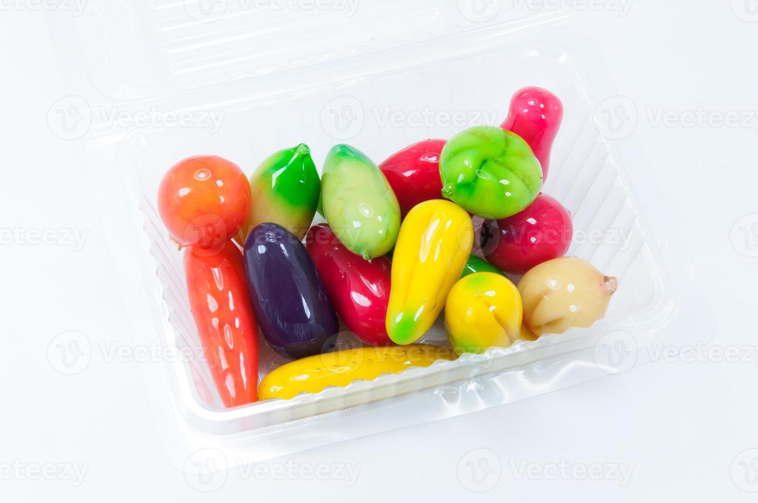 thai traditional dessert made with nut and coated with jelly on white background photo