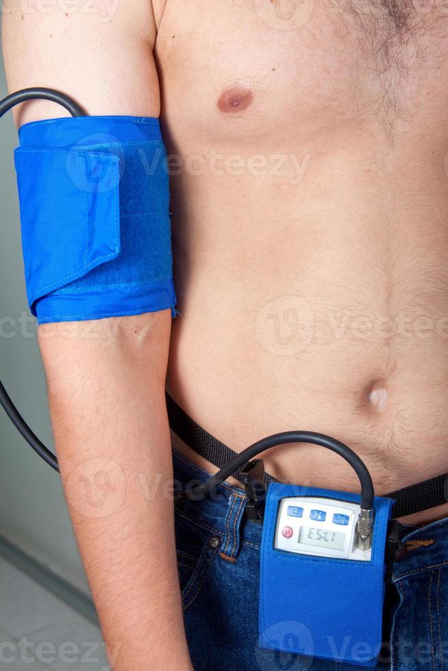 Holter Monitor on a male patient 22849999 Stock Photo at Vecteezy
