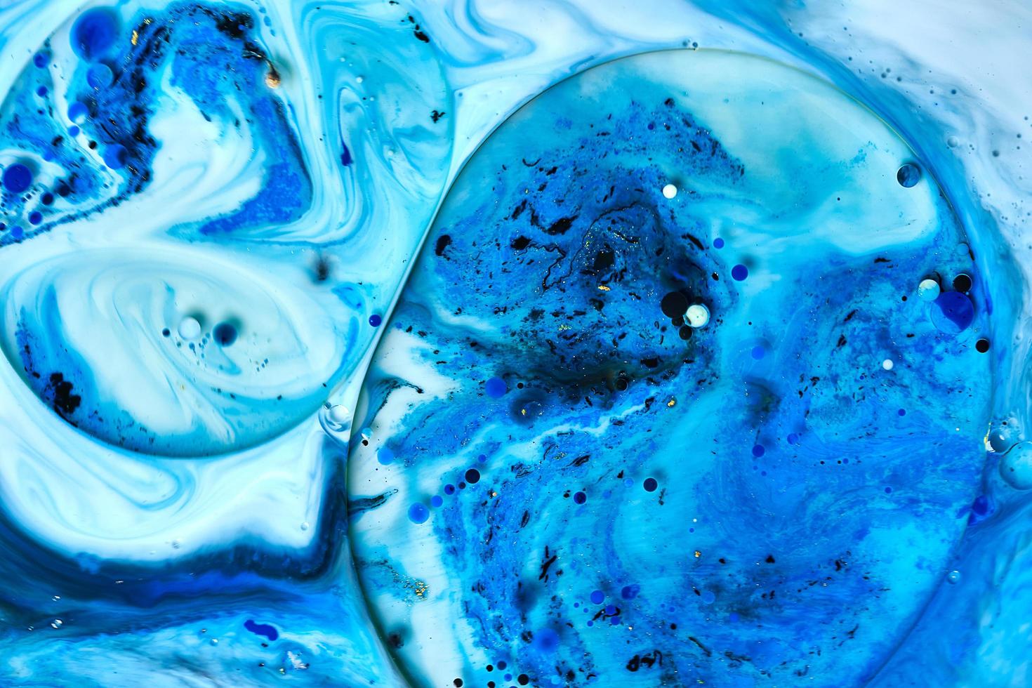 fluid art. abstract mix color liquid background. wallpaper design. blue, gold, white photo