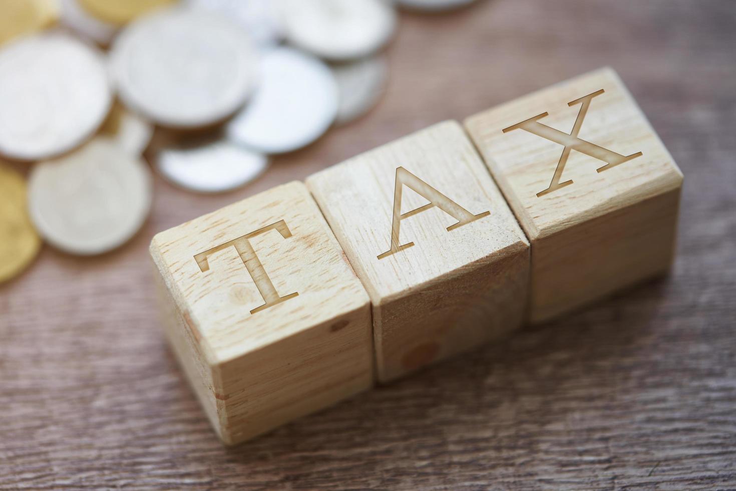 Business concept tax duty charge plan and strategy, bank trade Stock market, money Business Growth finance background. wood block and tax photo