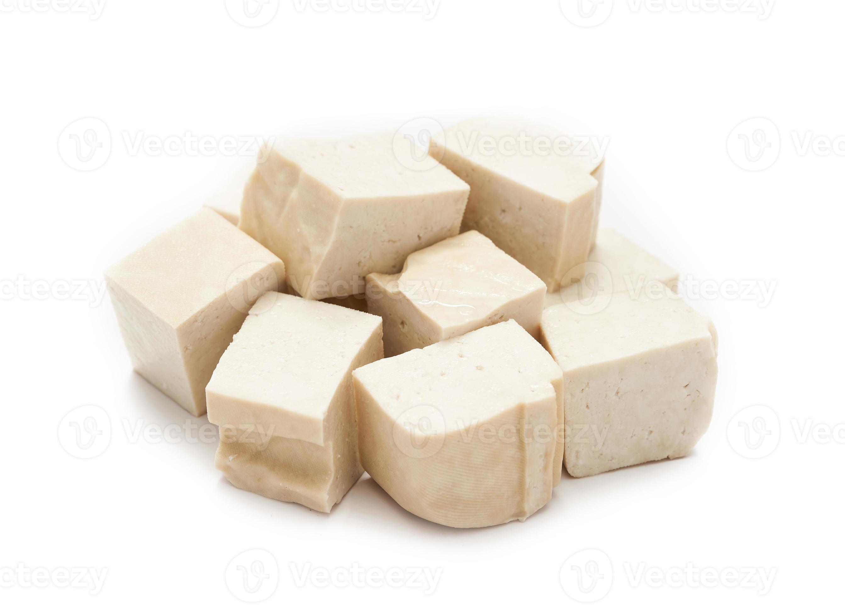pile of white cube Tofu isolated on white background. fresh white cube