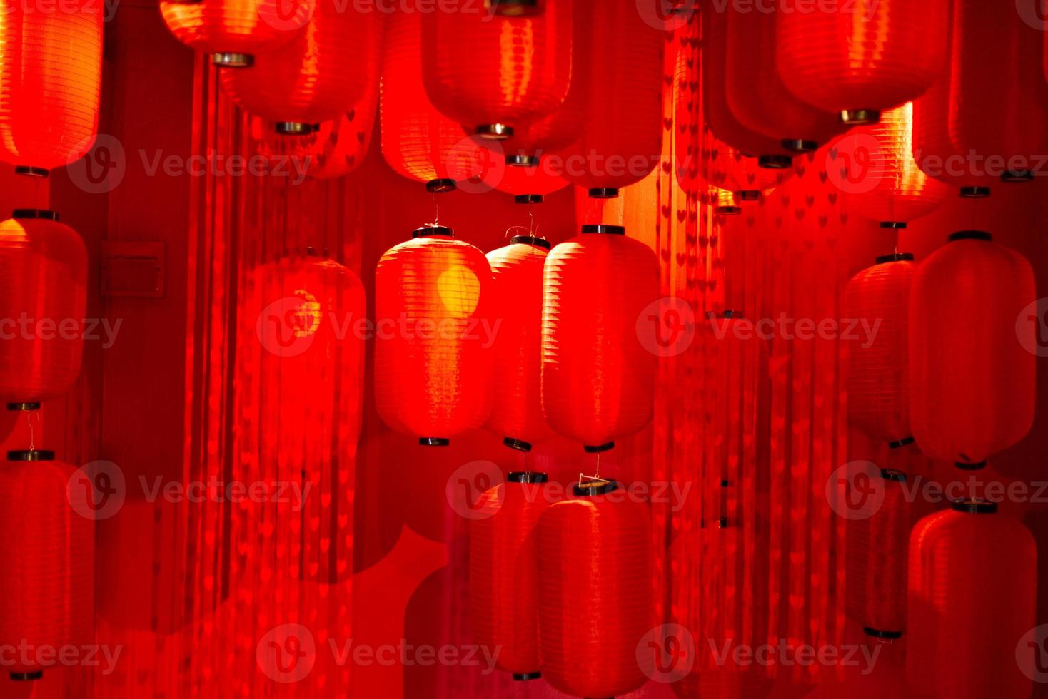 red Chinese lantern decoration room background with hearts shape curtain photo