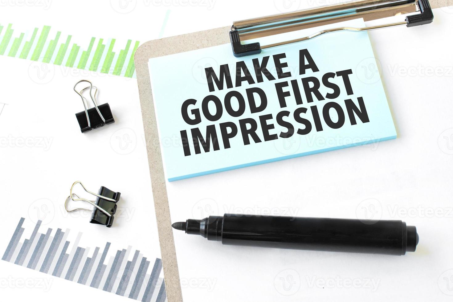 Paper plate, marker, diagram, chart and office tools. Text Make a good first impression photo