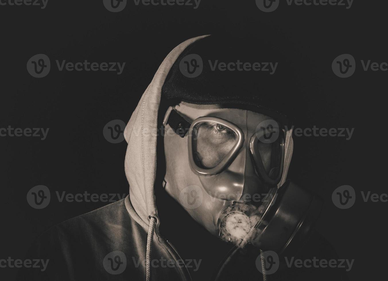Man with gas mask photo