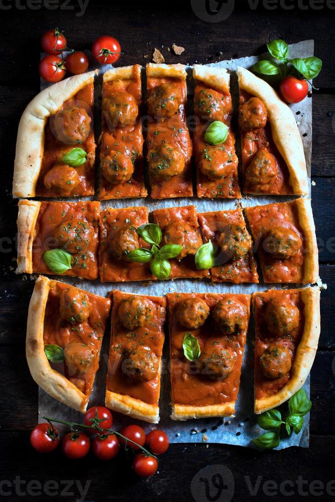 Sliced meatballs pizza photo