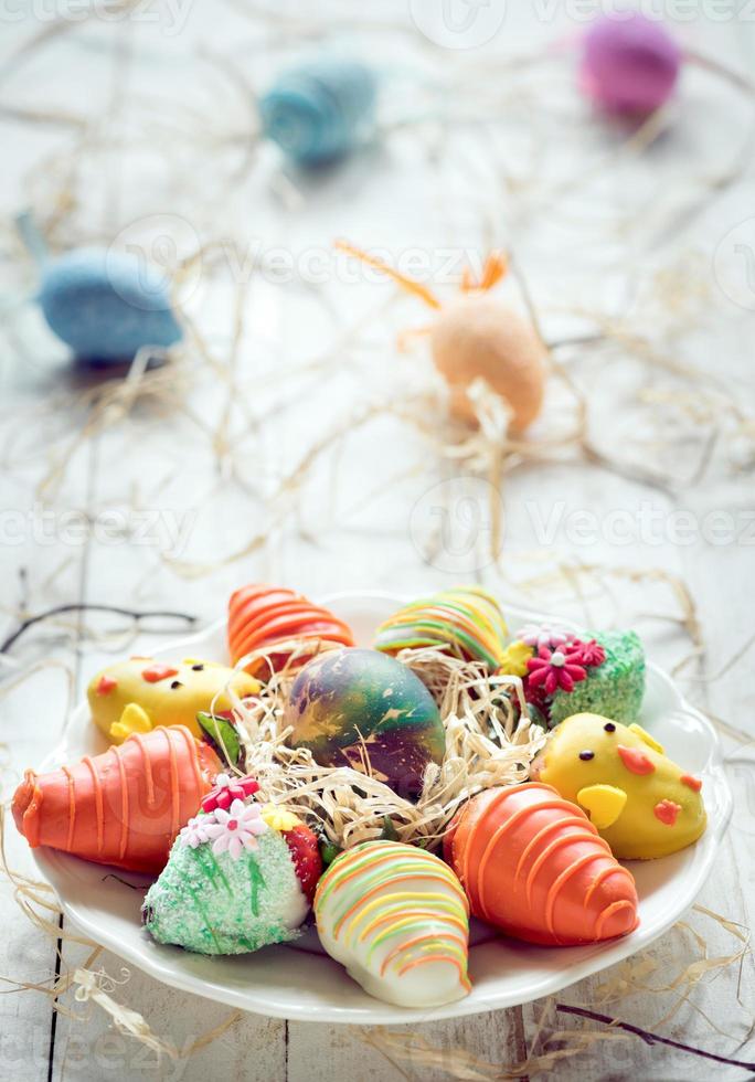 Easter strawberries served on the wooden background photo