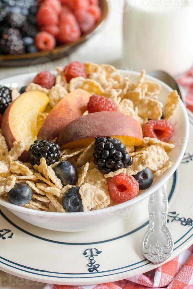 Berry fruits and corn flakes photo