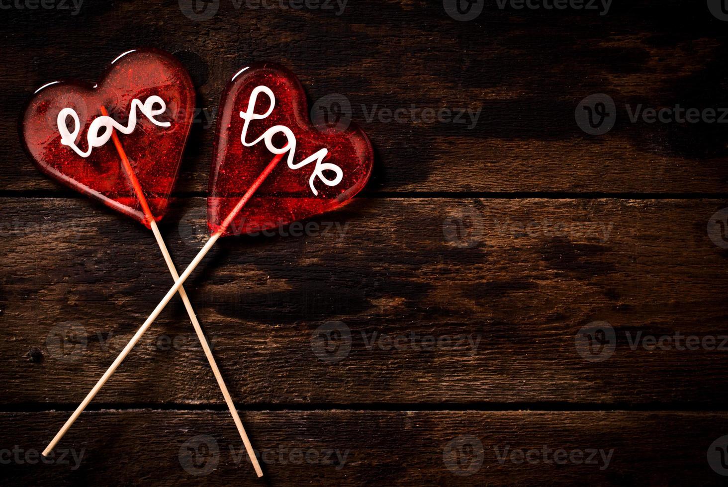 Two heart shape lolly pops photo