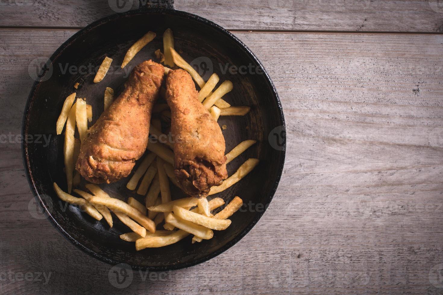 Junk food in the pan 22860960 Stock Photo at Vecteezy