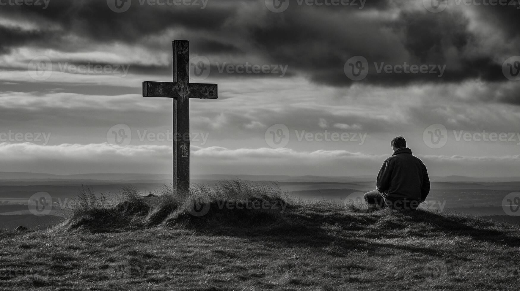 Man in front of a wooden cross in the countryside. Black and white. artwork photo