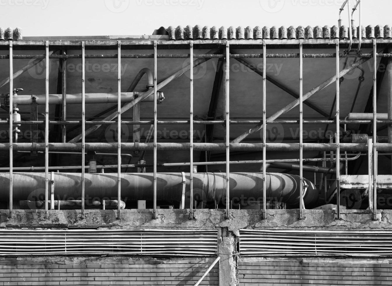 abandoned factory ruins in black and white photo