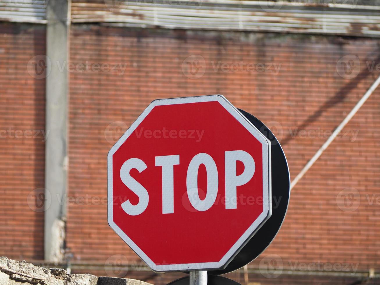 stop sign over blurred background photo