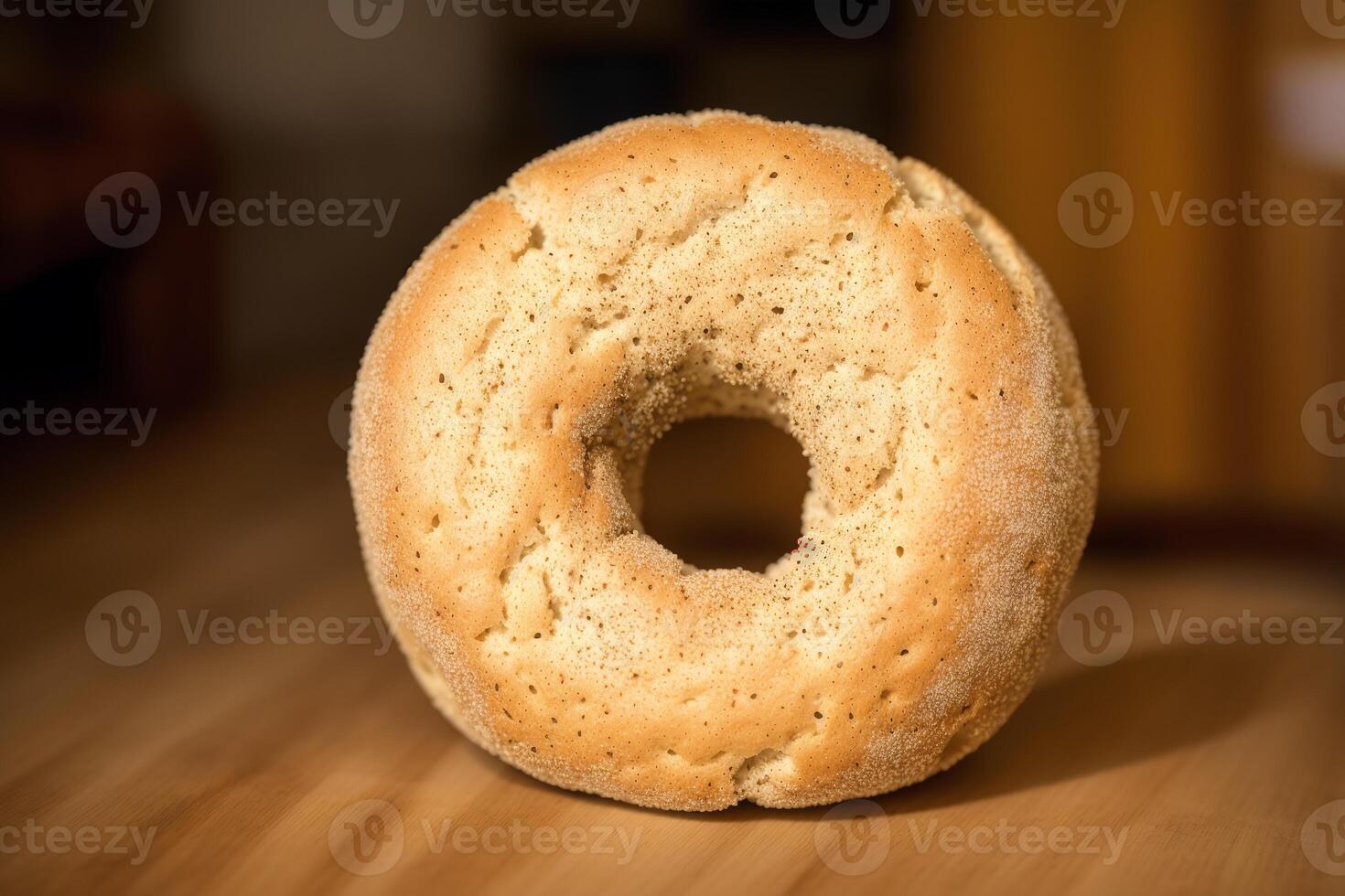 Freshly baked bread on a wooden board, close-up.Bagel photo