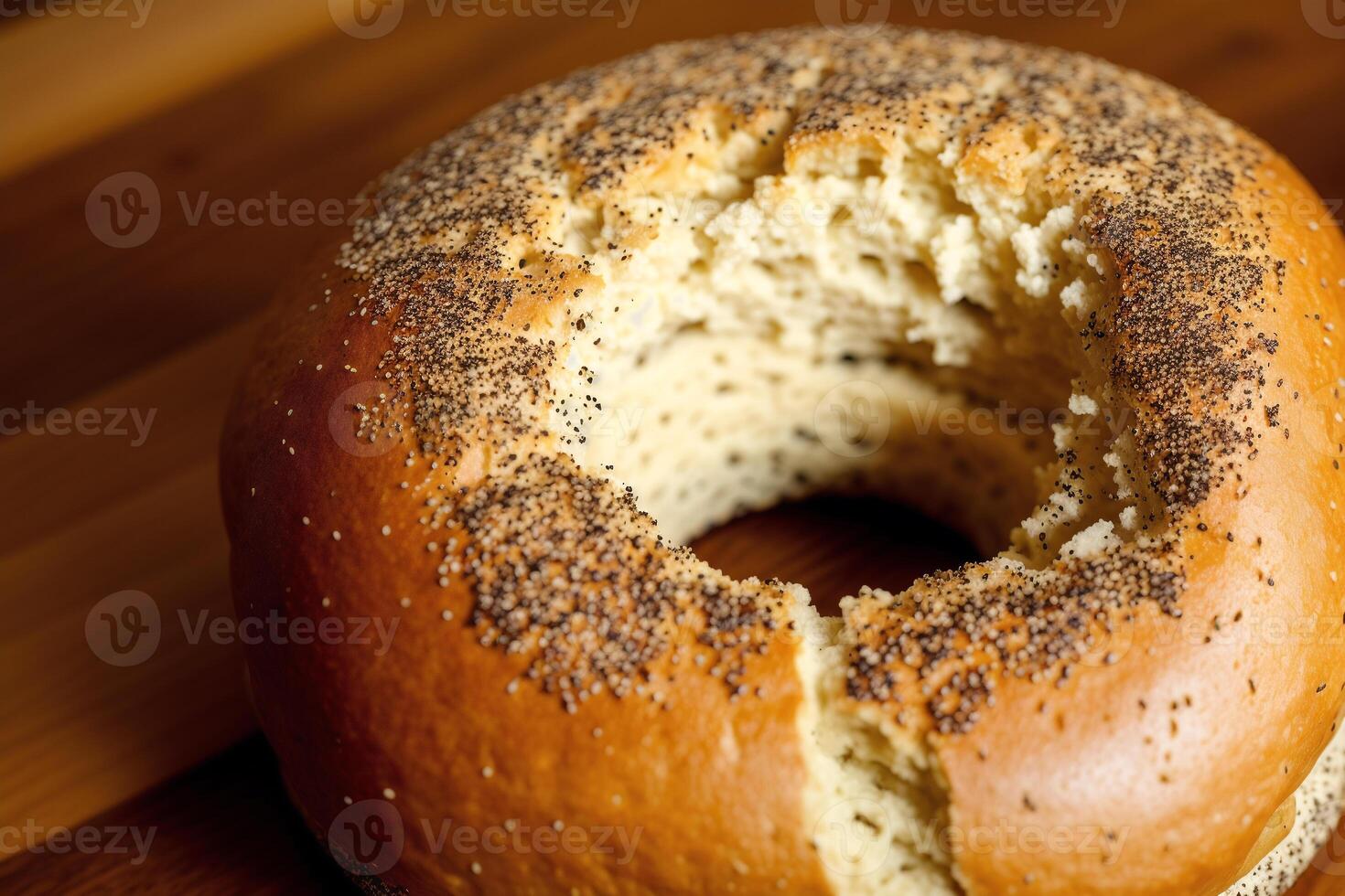 Freshly baked bread on a wooden board, close-up.Bagel photo