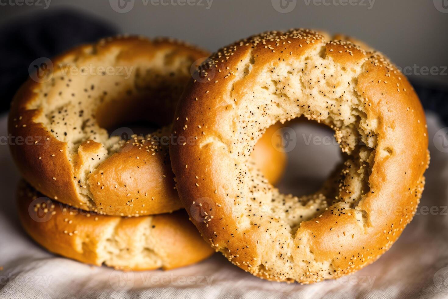 Freshly baked bread on a wooden board, close-up.Bagel photo