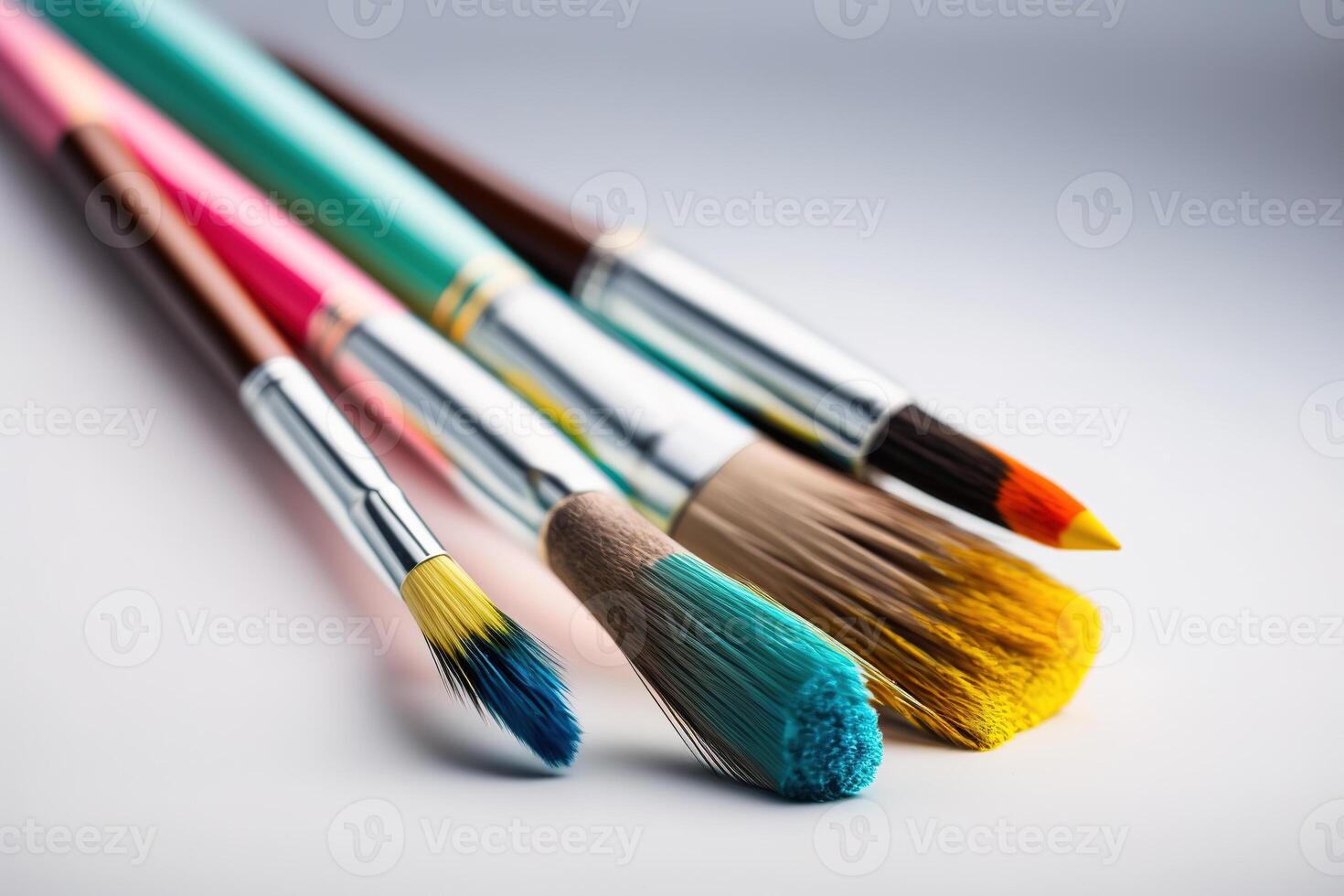 Colorful Paint Brushes with isolated white background and copy space. photo