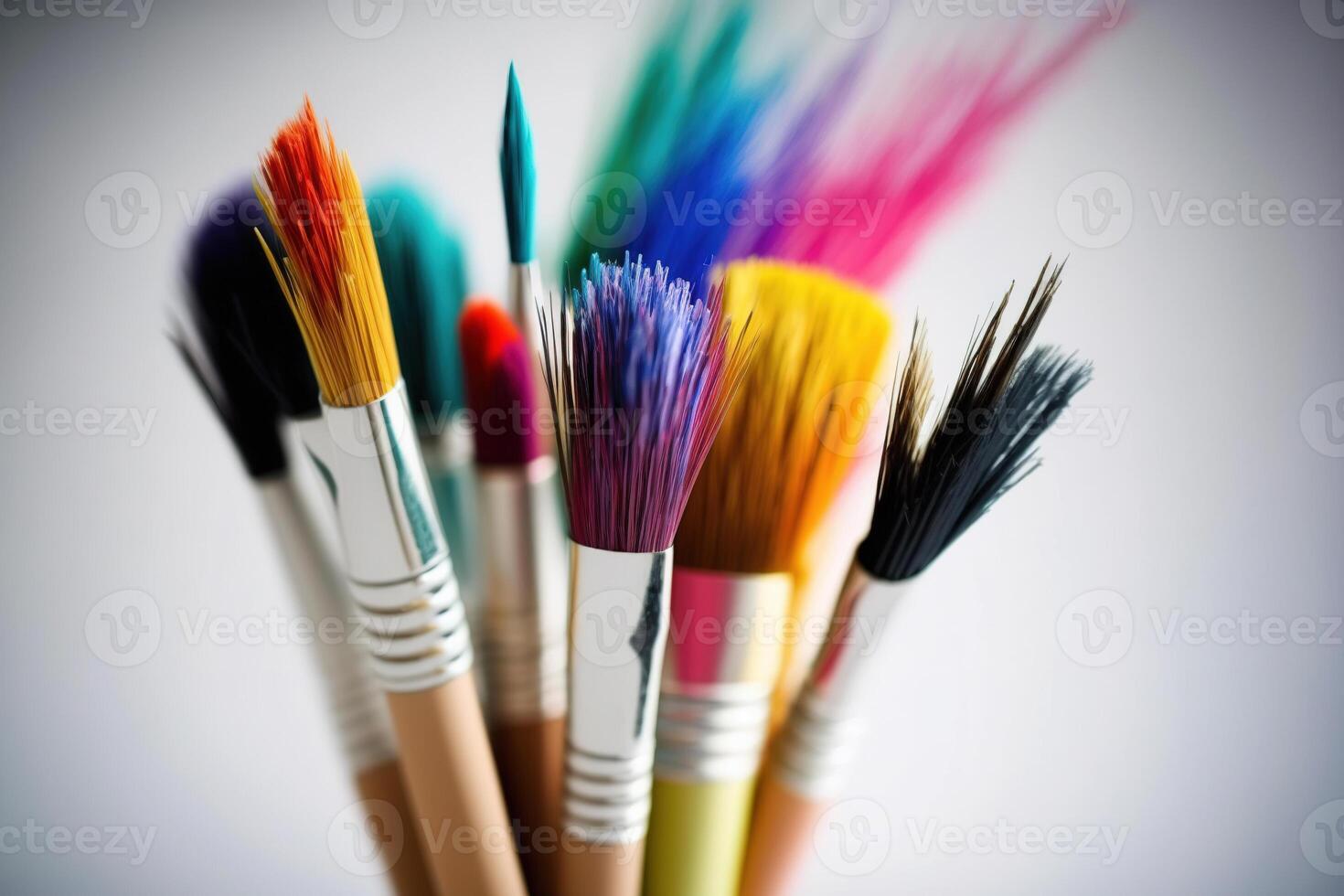 Colorful Paint Brushes with isolated white background and copy space. photo