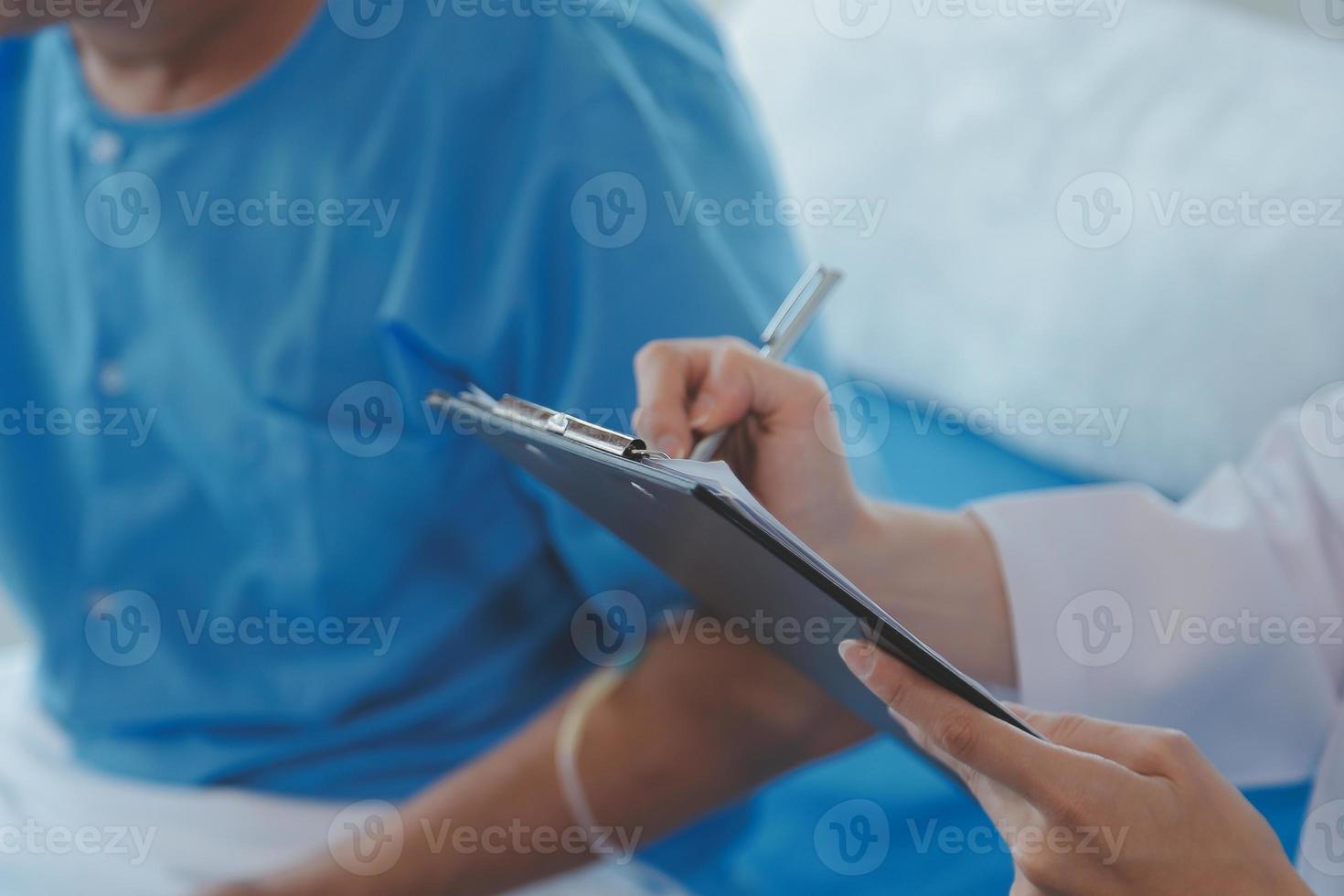 Injured patient showing doctor broken wrist and arm with bandage in hospital office or emergency room. Sprain, stress fracture or repetitive strain injury in hand. Nurse helping customer. First aid. photo