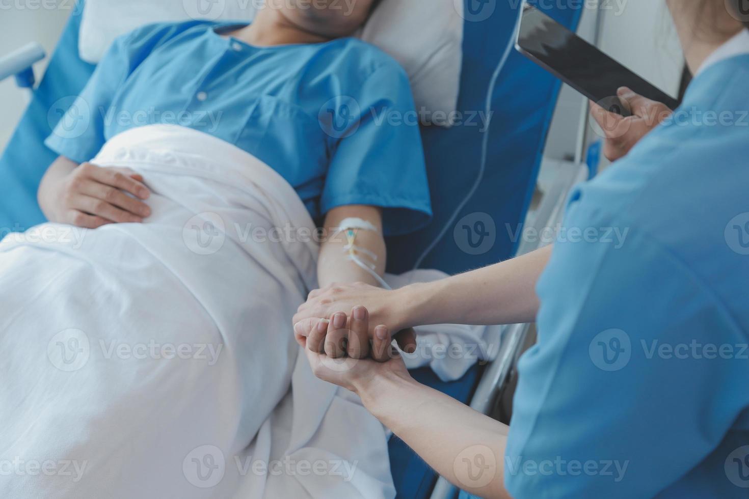 Injured patient showing doctor broken wrist and arm with bandage in hospital office or emergency room. Sprain, stress fracture or repetitive strain injury in hand. Nurse helping customer. First aid. photo