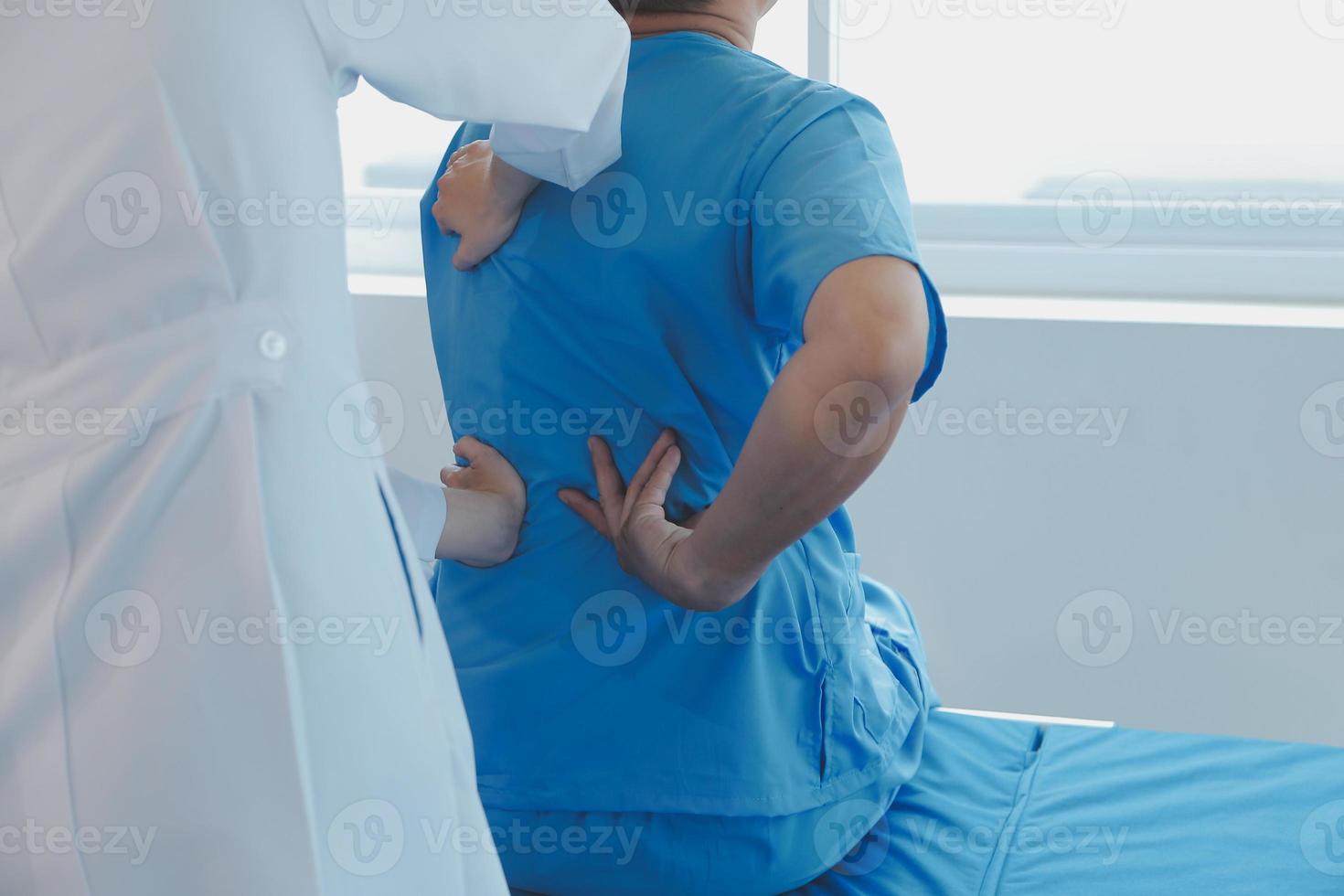 Patient doing some special exercises under supervision in a room photo