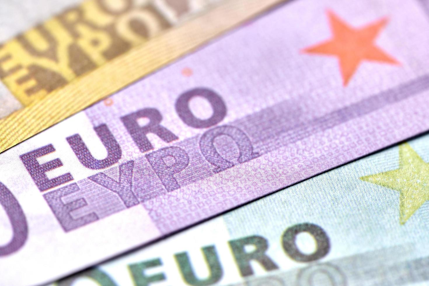 top view financial concept. euro money on desk background with copy space. flat lay photo