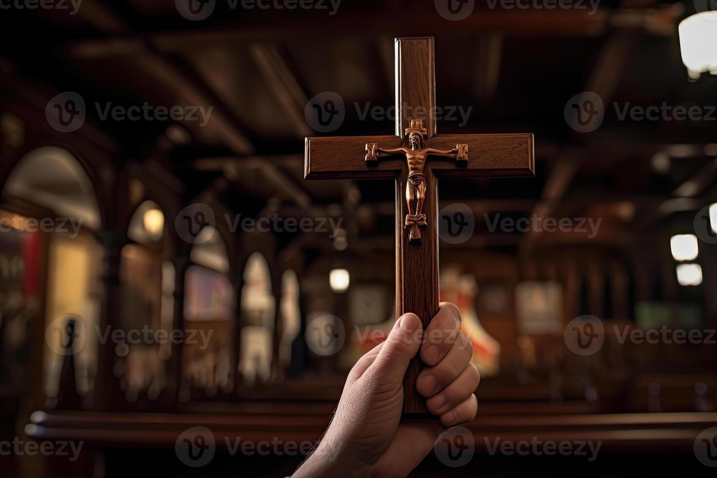 Church priest holds religious cross in hands. photo