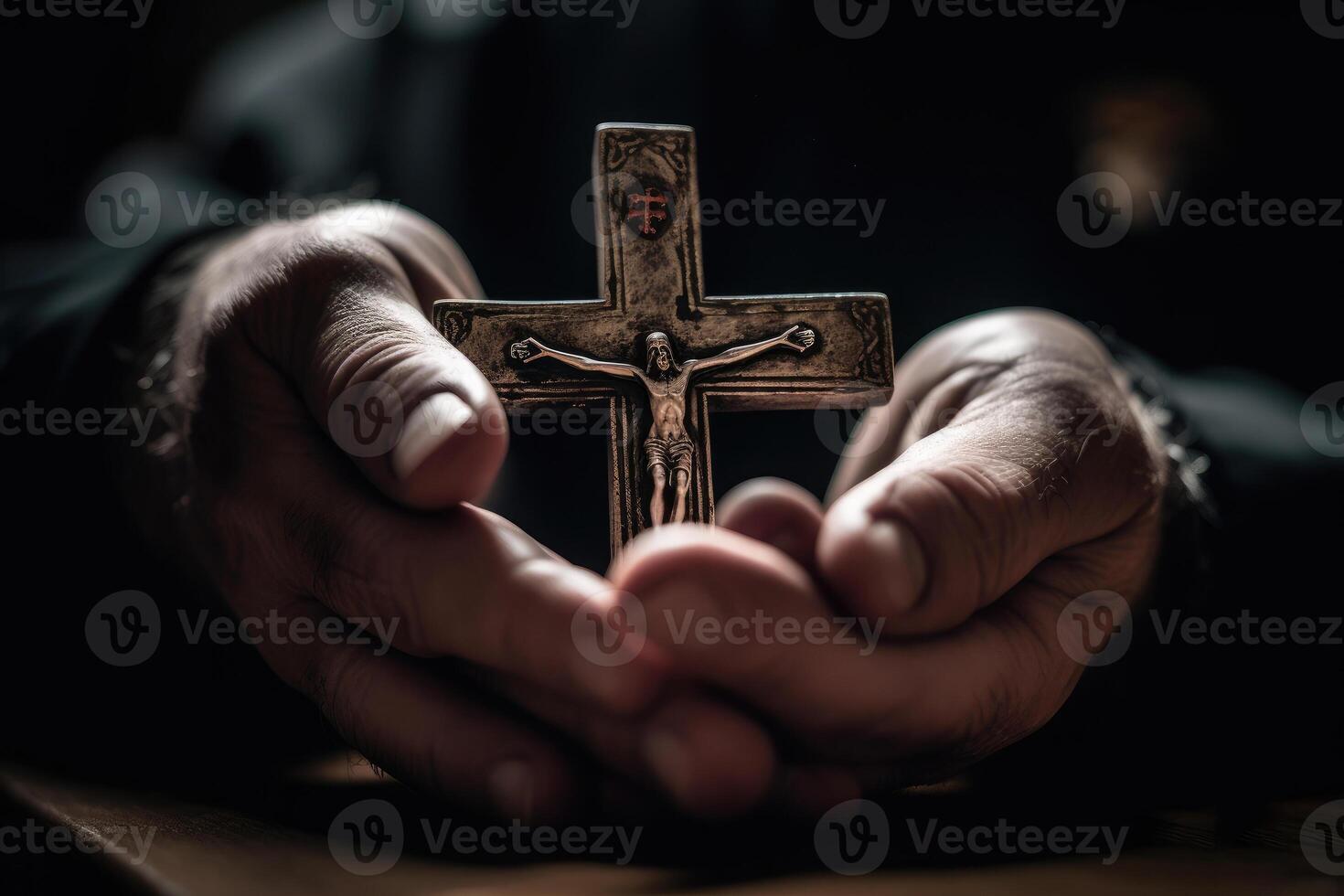 Church priest holds religious cross in hands. photo