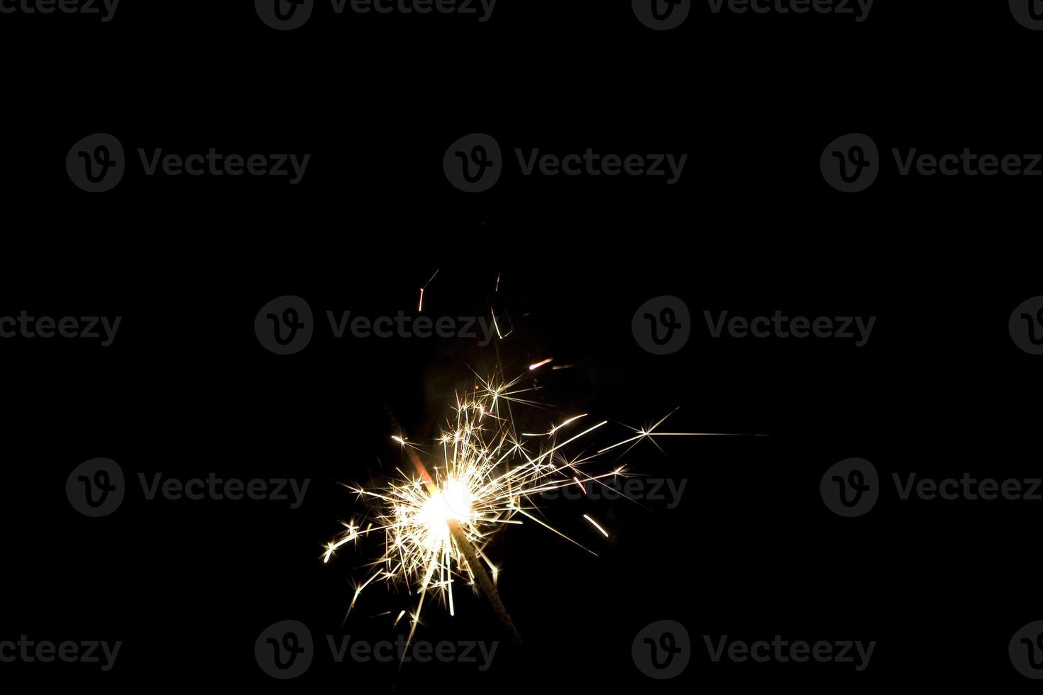 sparklers on a black background photo