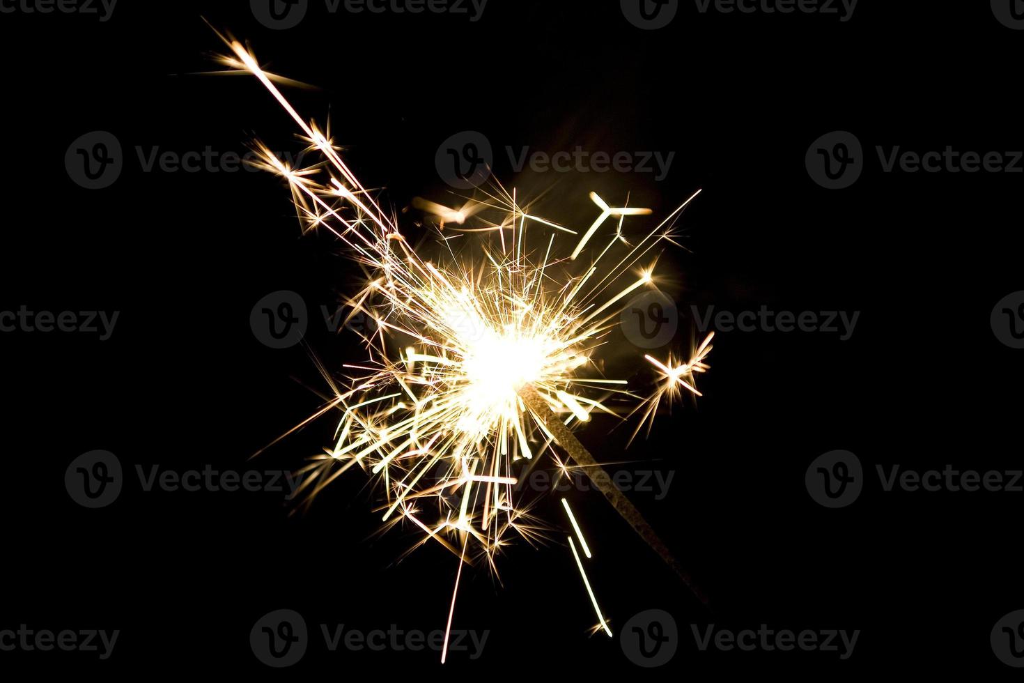 sparklers on a black background photo