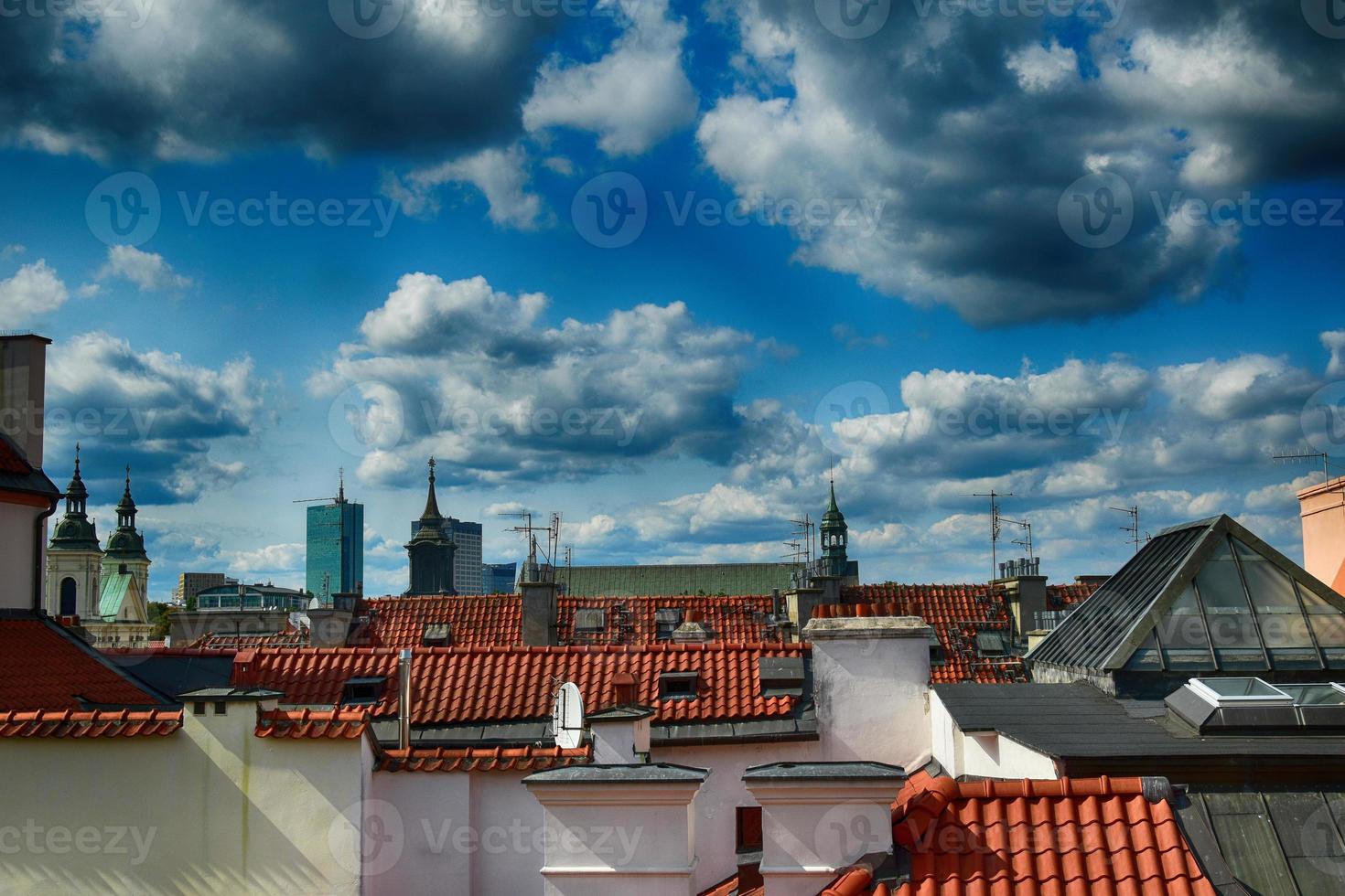 A view from above of the Warsaw old city and the surrounding buildings on a summer  day photo