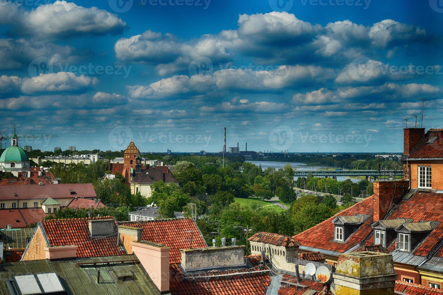 A view from above of the Warsaw old city and the surrounding buildings on a summer  day photo
