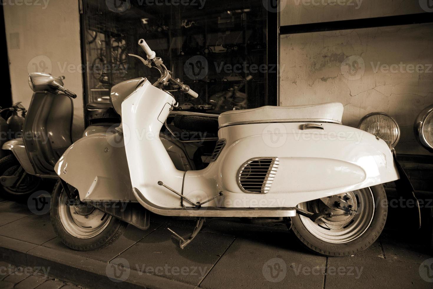 original old vintage retro vintage motorbikes standing in the museum photo