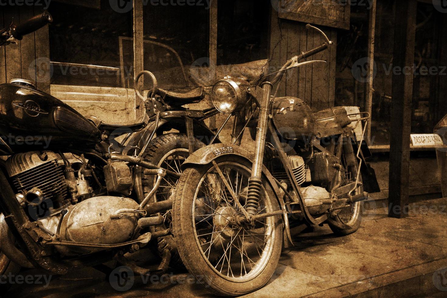 original old vintage retro vintage motorbikes standing in the museum photo