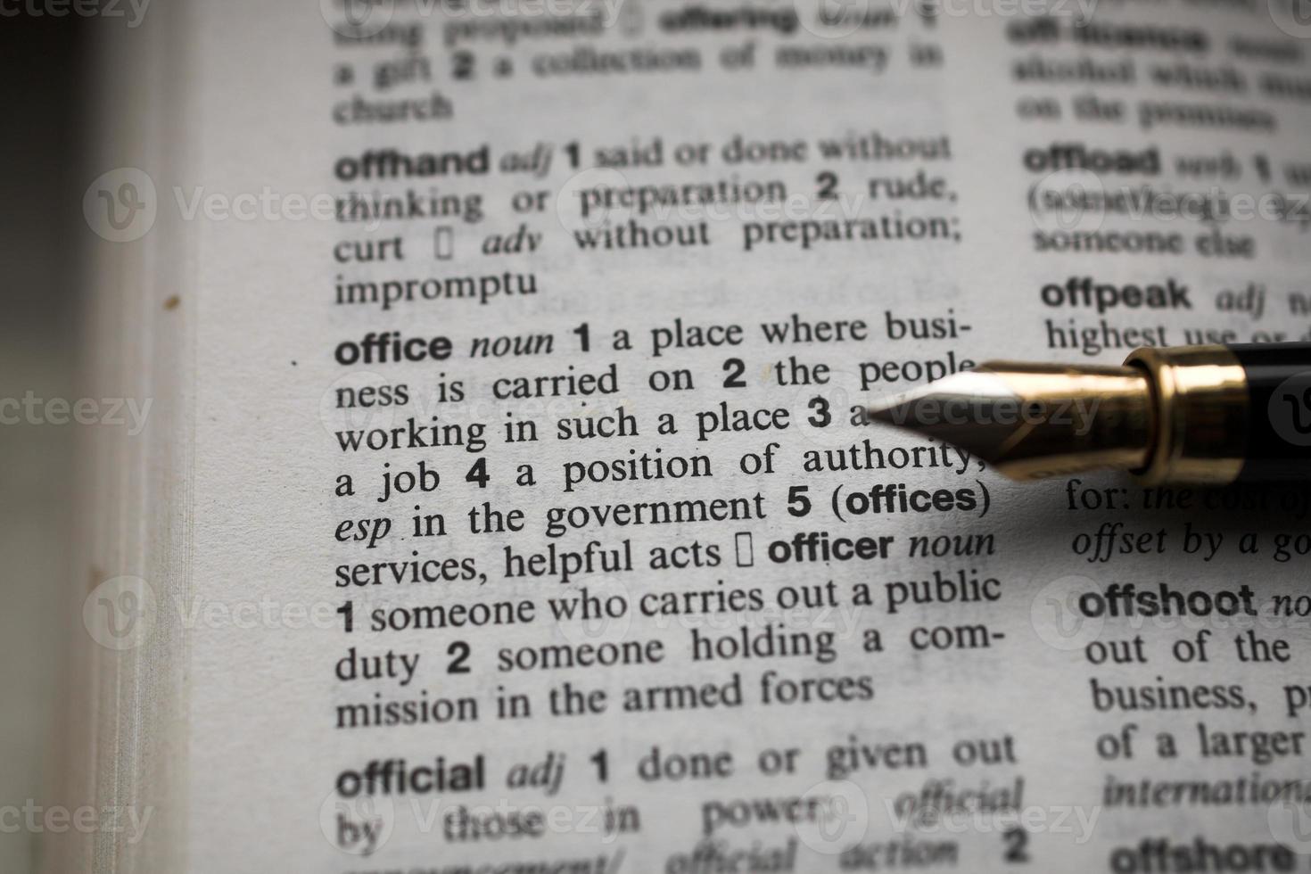 business fountain pen on a dictionary photo
