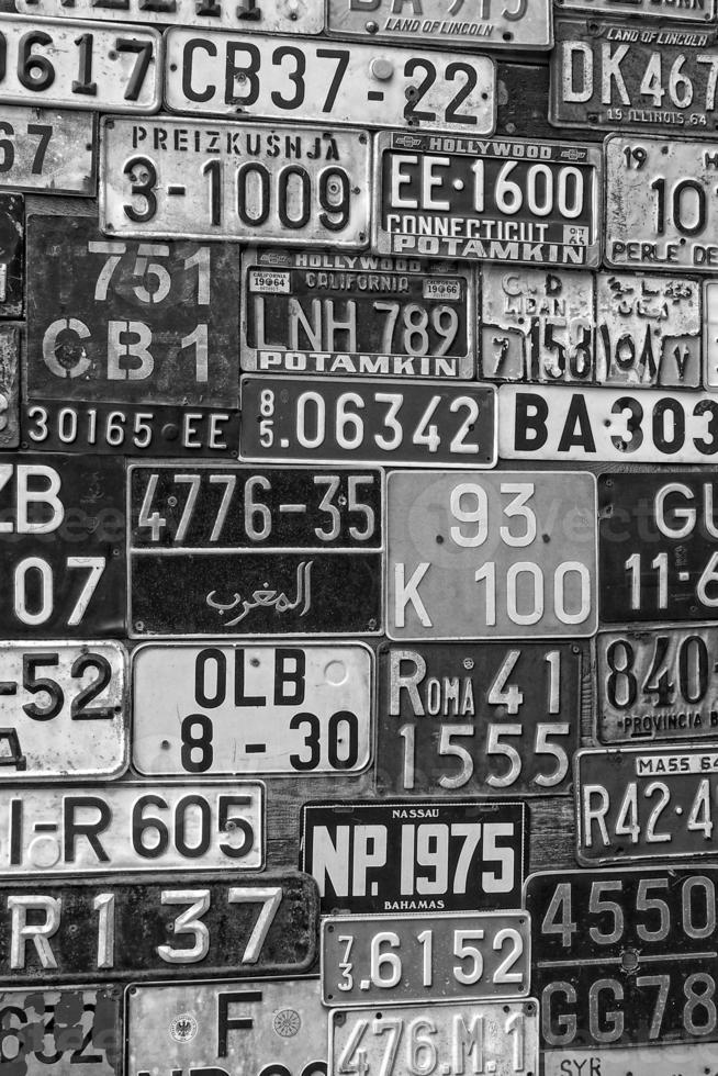 Various old car license plates from around the world at the museum