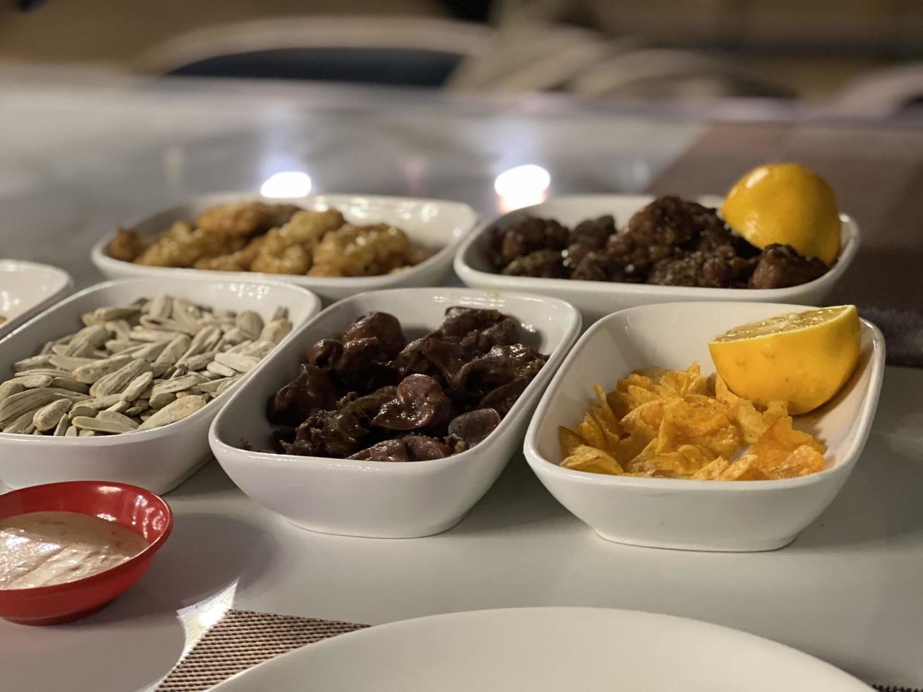 Close up of assorted snacks on a table in a restaurant photo